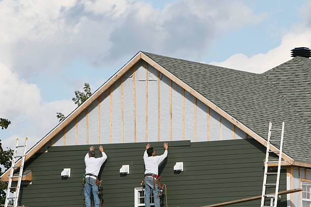 Professional Storm Damage Siding Repair technician working in New Buffalo, PA